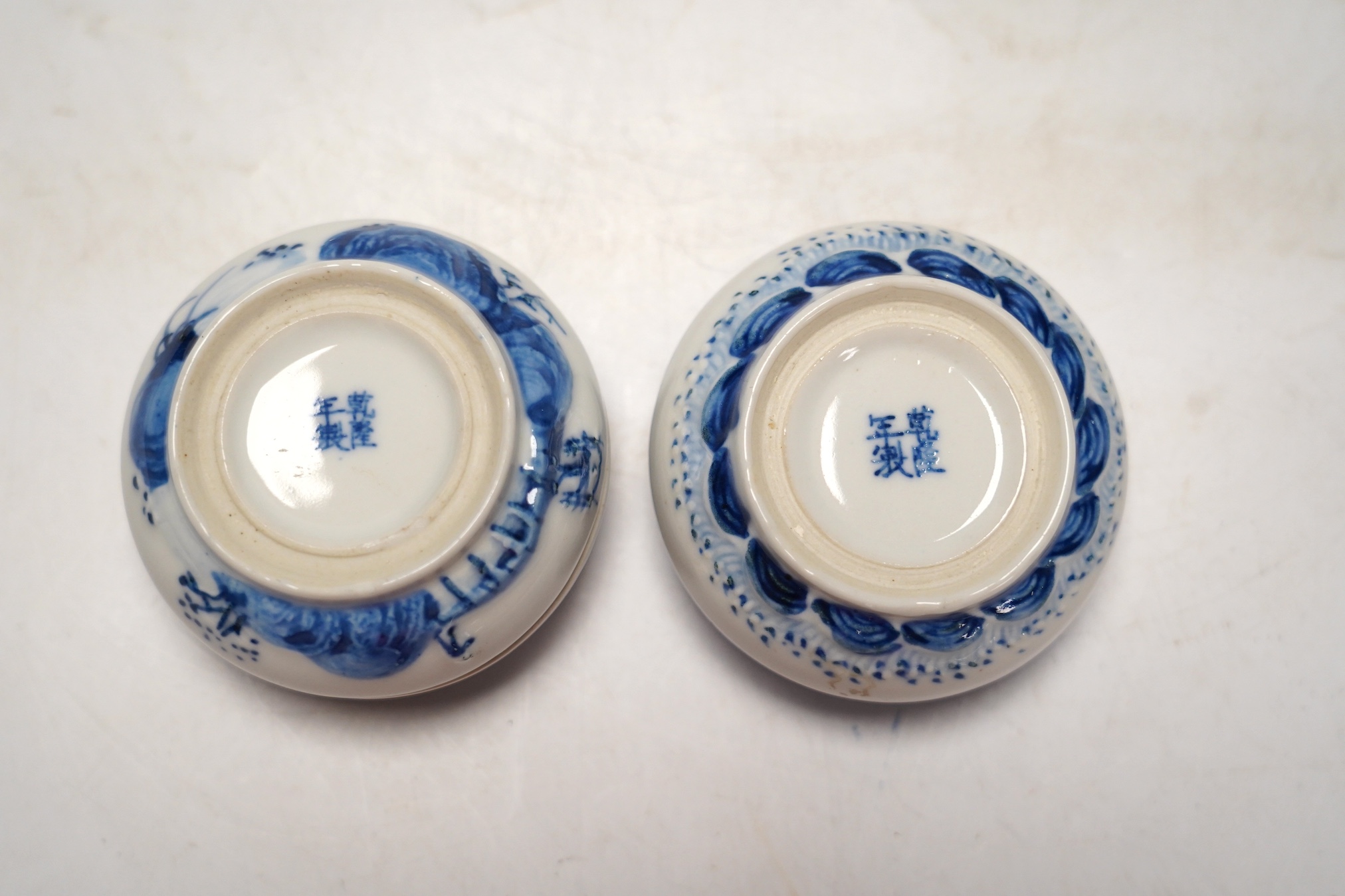 Chinese blue and white ceramics comprising crackle glaze vases and circular seal pots (4). Condition - fair to good, a few minor chips